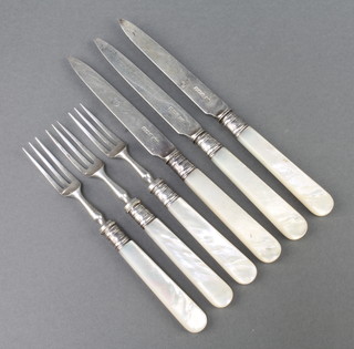 Three pairs of silver and mother of pearl handled fruit knives and forks Sheffield 1927 
