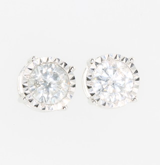 A pair of 18ct white gold single stone diamond screw back ear studs, approx. 2.17ct