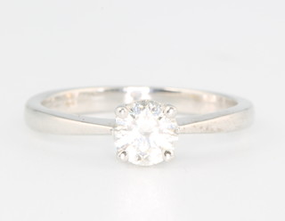 An 18ct white gold single stone brilliant cut diamond ring approx. 0.69ct, colour H/I clarity VS, size M, together with an EDR diamond report 