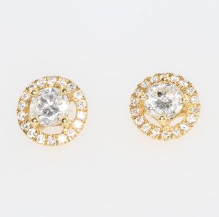 A pair of 18ct yellow gold diamond ear studs approx 0.5ct 