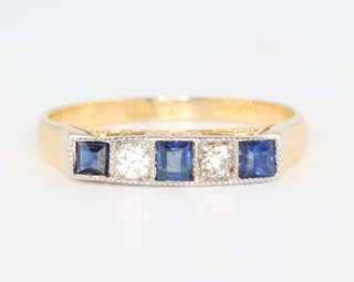 An 18ct yellow gold Princess cut sapphire and brilliant diamond ring size P