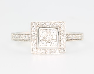 An 18ct white gold Art Deco style square diamond ring set with brilliant cut diamonds size M 1/2