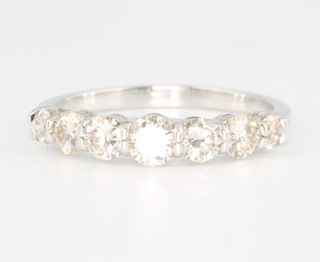 An 18ct white gold 7 stone graduated diamond ring approx. 1.01ct size N 