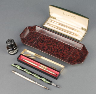 A gold plated Everlast pen and pencil boxed, minor pens and a Bakelite pen tray 