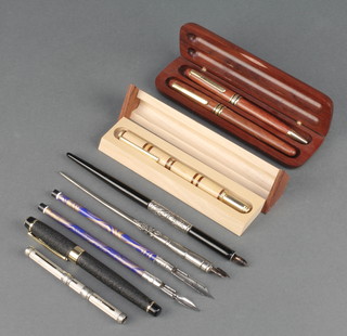 A Luoshi fountain pen with textured case and plated nib minor wood cased pens and dipping pens