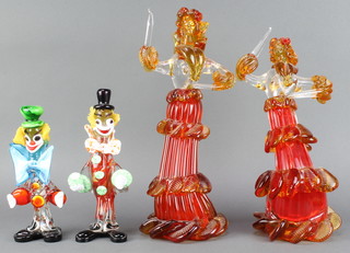 Two Murano clowns 9 1/2" and a pair of do. female dancers 15" together with a pound shaped money box 