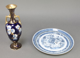 A Doulton Burslem Corolian Ware twin handled oviform vase, the blue ground with flowers and gilt detail 9 1/2" together with a 19th Chinese blue and white plate 8" 