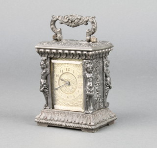 A 19th Century Continental carriage timepiece with gilded dial and Arabic numerals contained in a polished steel finished case 