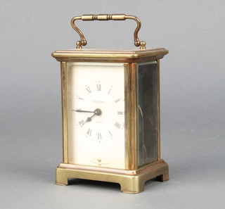 Bayard, a 20th Century 8 day French carriage timepiece with enamelled dial and Roman numerals contained in a gilt metal case 4 1/2"h x 3"w x 2 1/2"d (overwound) 
