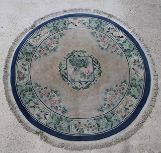 A blue and white circular Chinese rug decorated a peacock and birds 78" 