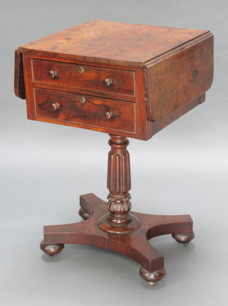 A Victorian rosewood drop flap work table fitted 2 long drawers, raised on turned and reeded column with triform base on bun feet 27 1/2"h x 16" when closed x 28 1/2" when open x 16"d
