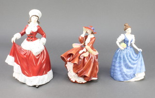 Three Royal Doulton figures - Pretty Ladies Winter HN5314 9", Top O'The Hill HN4778 7" and Helen HN4806 7" 