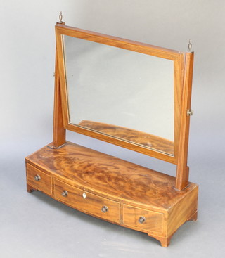 A 19th Century rectangular plate dressing table mirror raised on a bow front mahogany stand with 1 long and 2 short drawers, on bracket feet 22"h x 24"w x 9"d 