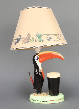 A Carlton Ware Guinness Toucan table lamp "How grand to be a Toucan, Just think what Toucan do If he can say as you can Guinness is good for you"  GA/2178 9 1/2" 
