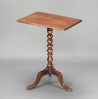 A Victorian mahogany rectangular snap top wine table raised on a bobbin turned column with tripod base 26 1/2" x 20"w x 14"d 
