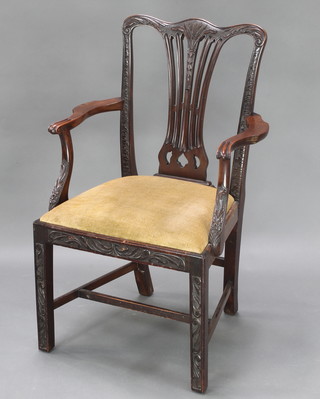 A 19th Century carved mahogany Hepplewhite style slat back carver chair with pierced slat back, upholstered drop in seat on square tapered supports