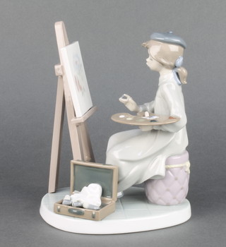 A Lladro group of a seated girl at an easel 5363 7" 
