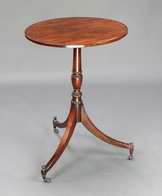 A Georgian oval inlaid mahogany wine table, raised on pillar and tripod supports with brass caps and castors 28"h x 20"w x 17"d 