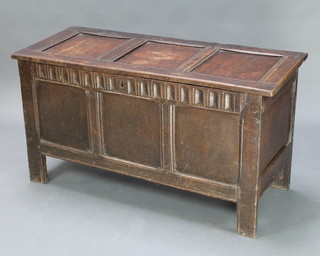 An 18th Century oak coffer of panelled construction with arcaded decoration 25"h x 47"w x 19"d 