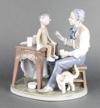 A Lladro group of Geppetto and Pinocchio 5396 10" 