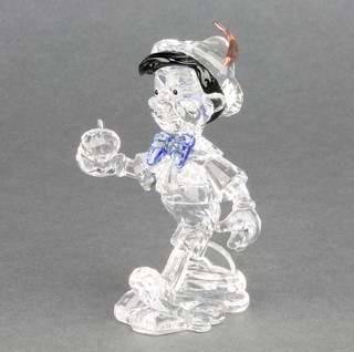 A Swarovski Crystal figure of Pinocchio 3 1/2"  boxed