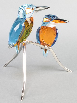 A Swarovski coloured Crystal group of 2 woodpeckers on a branch 7 1/2"  boxed
