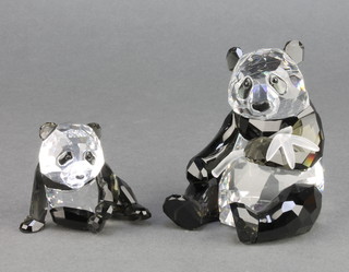 A Swarovski coloured Crystal figure of a seated panda 3 1/2" and cub 2 1/2"  boxed