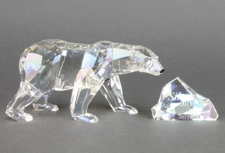 A Swarovski Crystal figure of a polar bear - Siku 2011 7" together with an inscribed iceberg 3" boxed