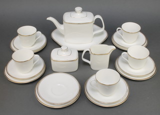A Royal Doulton Gold Concord coffee set comprising coffee pot, cream jug, sugar bowl and lid, 5 cups, 6 saucers, 6 side plates and a sandwich plate 