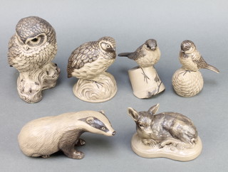 A brown glazed Poole figure of a badger 738 8", a ditto of a grouse 5", a wren 5", a tit 5", a faun 5" and an owl 7" 