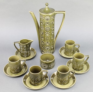 A Portmeirion Totem pattern green coffee set comprising coffee pot, cream jug, sugar bowl, 5 coffee cans and 6 saucers