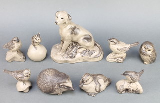 A Poole figure of a seated dog 8", do. owl 3", wren 3", hedgehog 5", field mouse 4", wren 3", duckling 4", tit 3" and a chaffinch 4" 