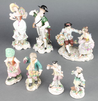 A 20th Century German porcelain group of a lady and gentleman seated on stumps 5", a pair of similar figures on Rococo bases 8", a similar pair sitting on stumps 4" and a lady and gentleman on raised bases 3" 