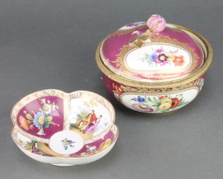 An early 20th Century German porcelain lidded bowl, the burgundy ground with panels of spring flowers 5" together with a Dresden cabinet saucer 