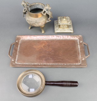 A circular Japanese gilt metal twin handled Koro, the base with seal mark 6", a rectangular Newlyn twin handled copper tray the base marked JP  (John Pearson) 13" x 7 1/2", a Victorian square brass inkwell with glass liner 2" x 4", a magnifying glass with brass bound and turned wooden handle 4" 