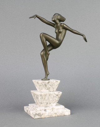 A spelter figure of a naked dancing girl raised on a stepped white marble base 11" (foot f and r) 
