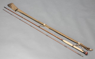 An Army & Navy 9' split cane trout fishing rod complete with cloth bag 