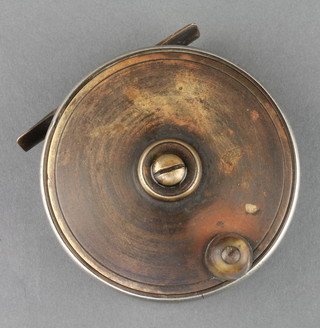 A brass and ebonite fishing reel 