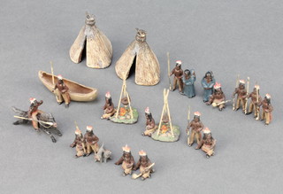 Ten cast metal figures of native American Indians and 2 wigwams 