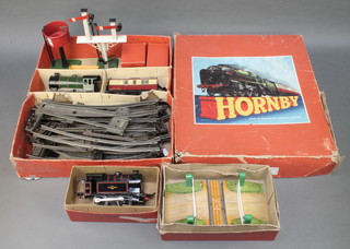 A Hornby No.40 O gauge tank locomotive boxed, a Hornby O gauge no.1 level crossing boxed and a Hornby passenger train set no.51 comprising tank engine, carriage and various rails boxed
