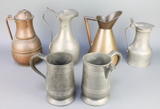 A Victorian 1 quart spouted measure the base marked White Lion Maidstone, do. quart measure, a Continental baluster shaped pewter tankard with acorn thumb piece 7", a pewter jug by James Dixon 10" and 2 copper jugs 