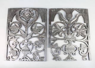 A pair of 18th/19th Century pierced and carved oak panels with floral decoration 13 1/2" x 10 1/2" 