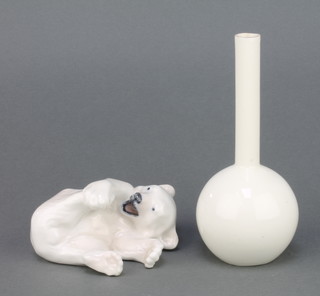 A Royal Copenhagen figure of a polar bear cub 4 1/2" and a Royal Worcester white glazed bottle vase 6" 