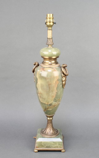 A polished onyx and gilt metal baluster shaped twin handled table lamp 19" 