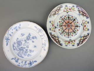 An 18th Century English Delft blue and white plate decorated with flowers 10", an 18th Century English Delft polychrome plate with stylised fruits 10" 