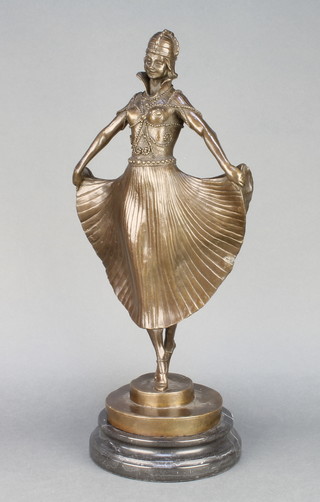 An Art Deco style figure of a standing dancer raised on a marble socle base 18" 