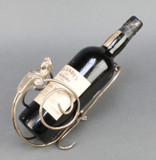 A bottle of 1954 Bual Blandy's Madeira, together with a silver plated bottle cradle 