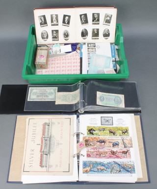 An Ace album of various used world stamps, a collection of loose stamps, loose tea cards, an album of Ogden's Guinea Gold cigarette cards and an album of bank notes and First World War postcards 