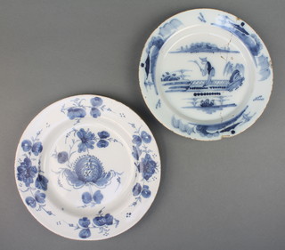 An 18th Century English Delft blue and white plate decorated in the chinoiserie style within landscape 8 1/2", a do. with stylised floral decoration 9" 