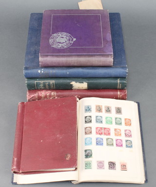 A small blue album of World stamps including GB used Victorian and later, Falkland Islands, France, Germany, Holland, Honduras, India, Italy, a small red album of used World stamps Chile, Ceylon, China, Cyprus, Denmark, Dominican Republic, Egypt, a 1935 Silver Jubilee album, 2 Simplex albums and 1 other containing World stamps Romania, South Africa, Southern Rhodesia, Spain, Swaziland, Trinidad and Tobago, Turkey, United States, Vatican City, Aiden, Argentina, Australia, Belgium, Belgian Congo, Bolivia